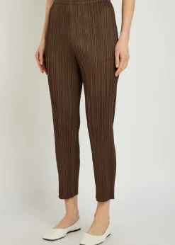 Pleated tapered-leg woven trousers