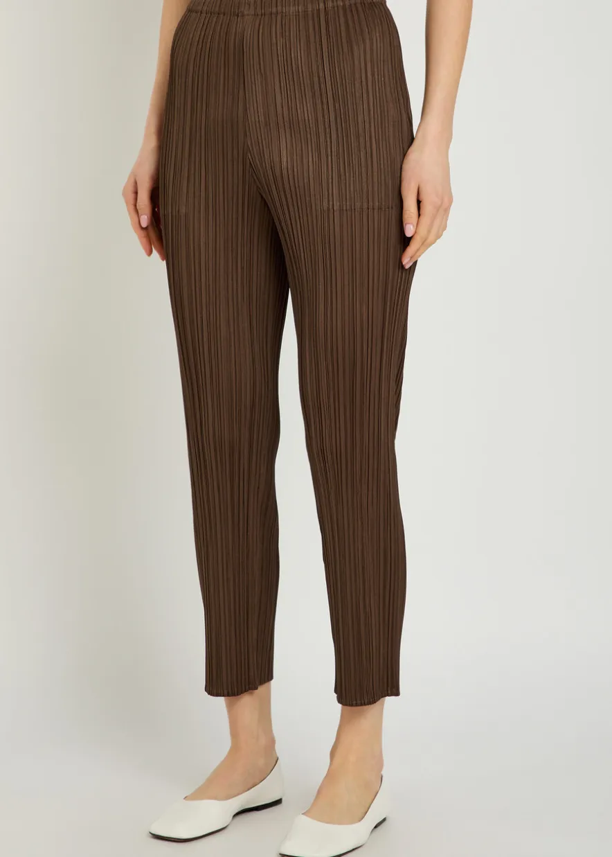 Pleated tapered-leg woven trousers