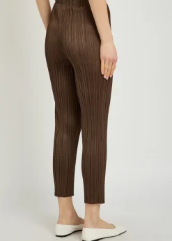 Pleated tapered-leg woven trousers