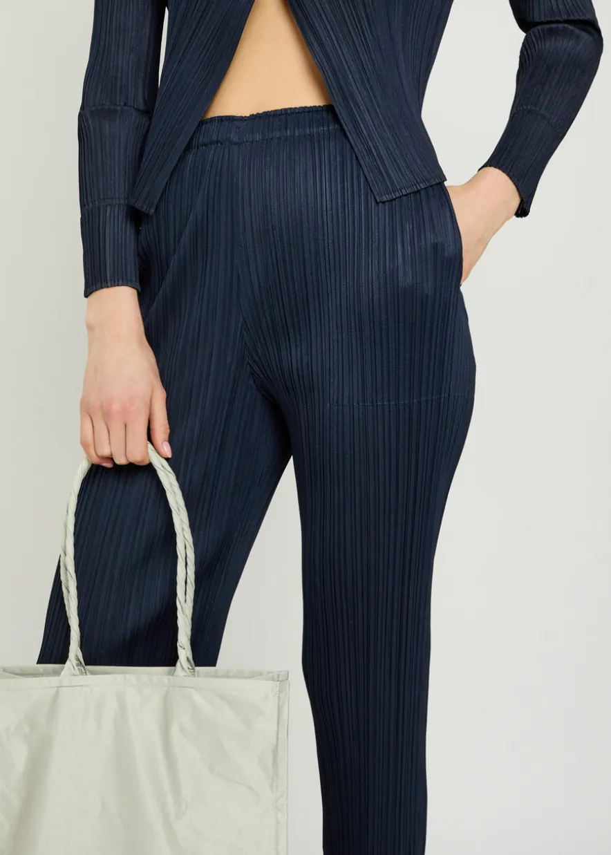Pleated tapered-leg woven trousers