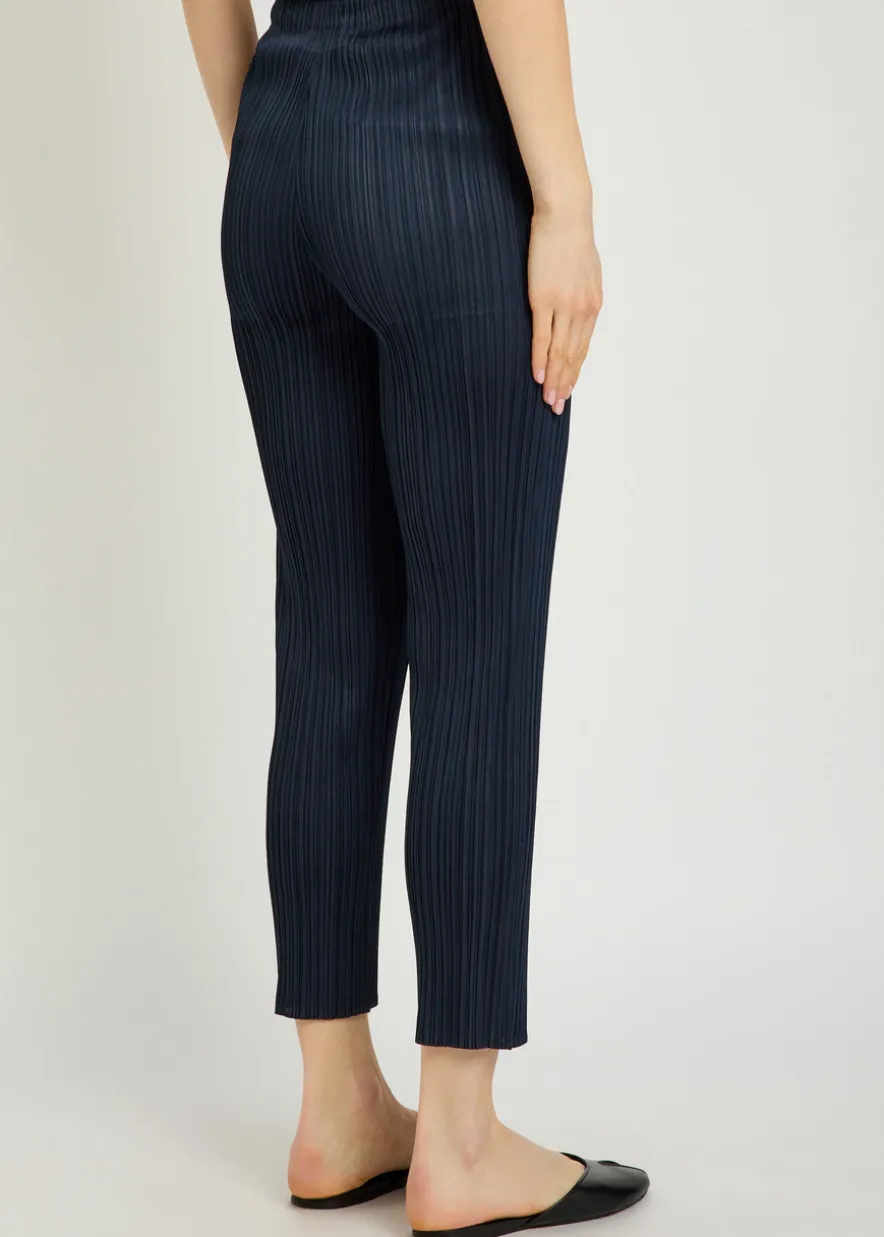 Pleated tapered-leg woven trousers