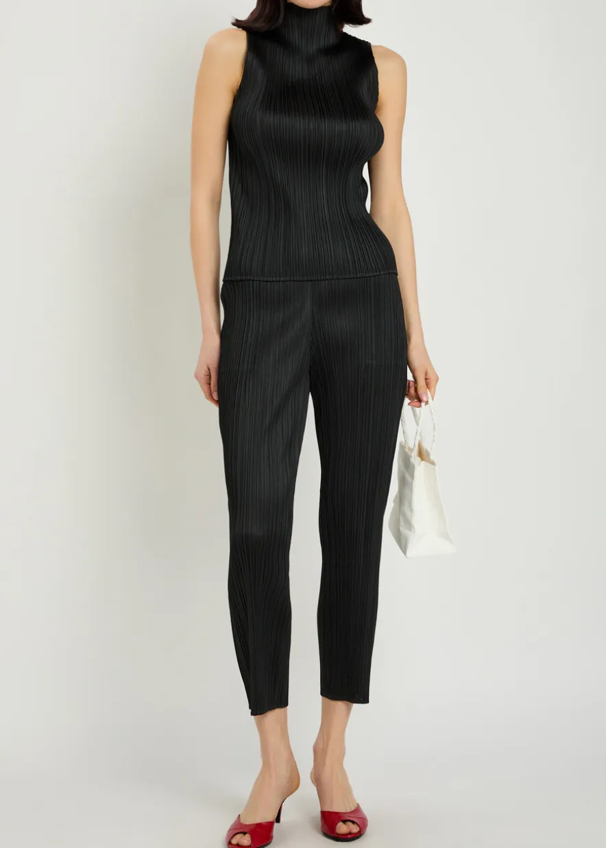Pleated tapered-leg woven trousers