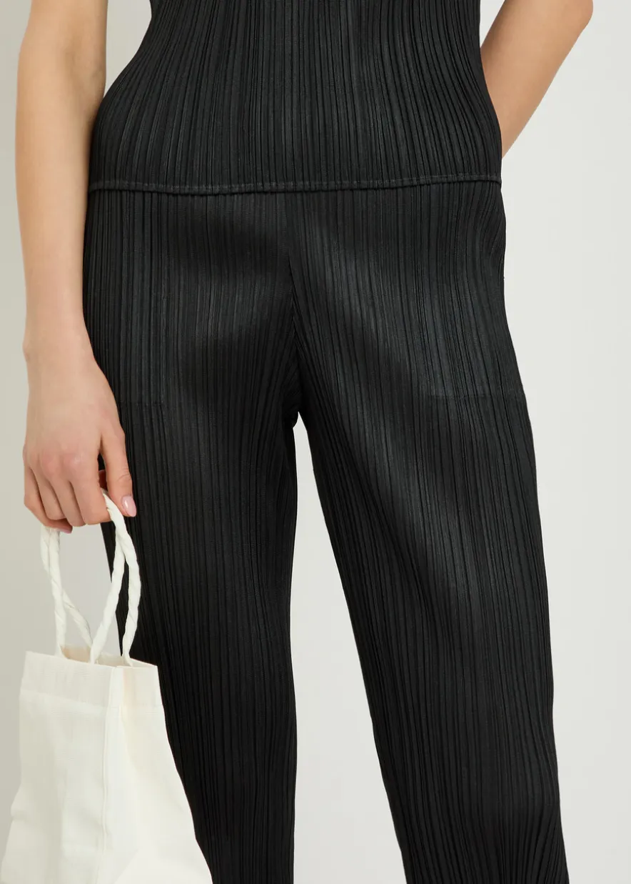 Pleated tapered-leg woven trousers