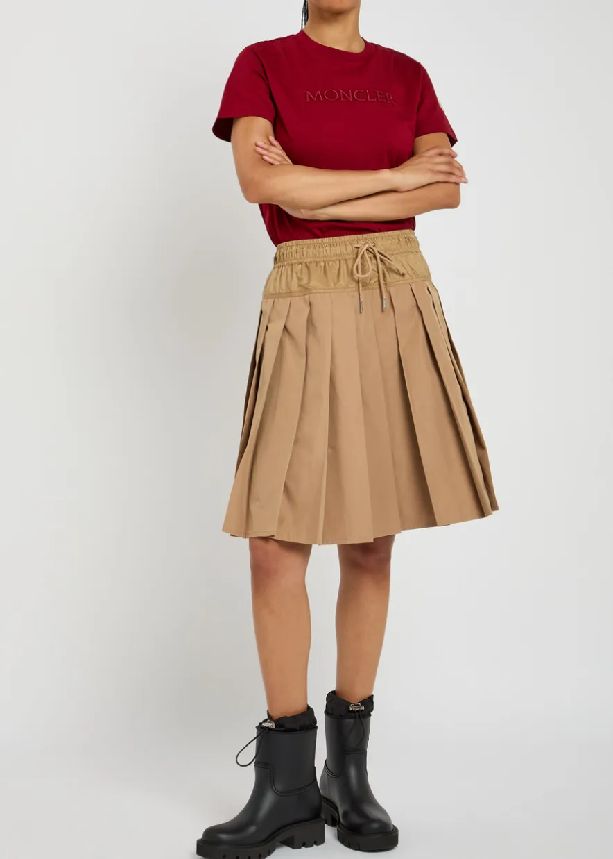 Pleated woven mini skirt