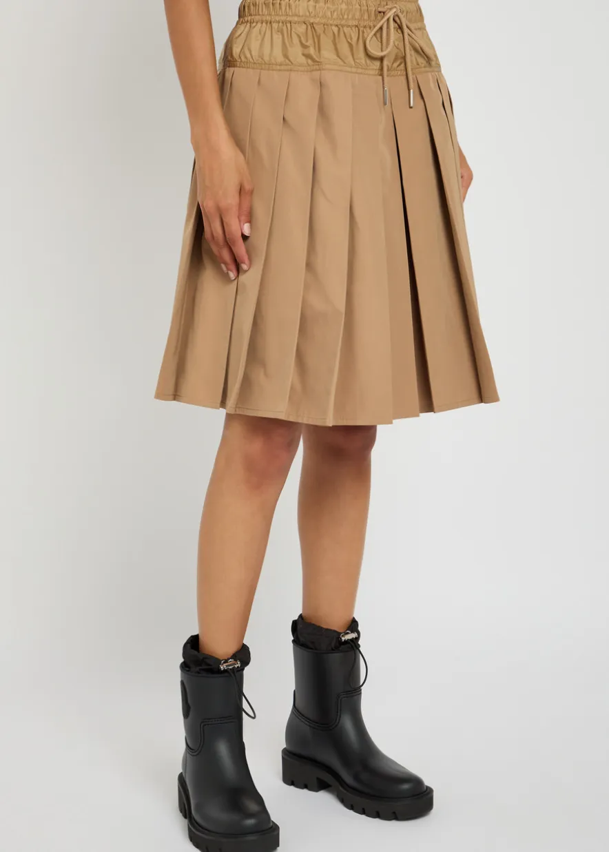 Pleated woven mini skirt
