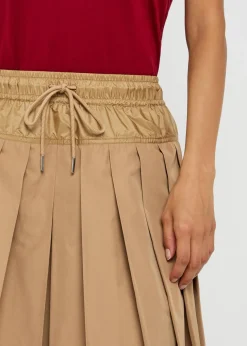 Pleated woven mini skirt