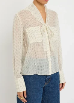 Polka-dot tie-neck silk blouse