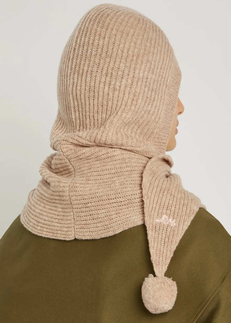 Pom-pom knit hood