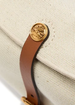 Pony canvas and leather cross-body bag