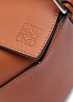 Puzzle Edge small leather top handle bag
