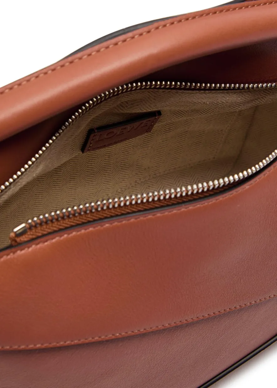 Puzzle Edge small leather top handle bag