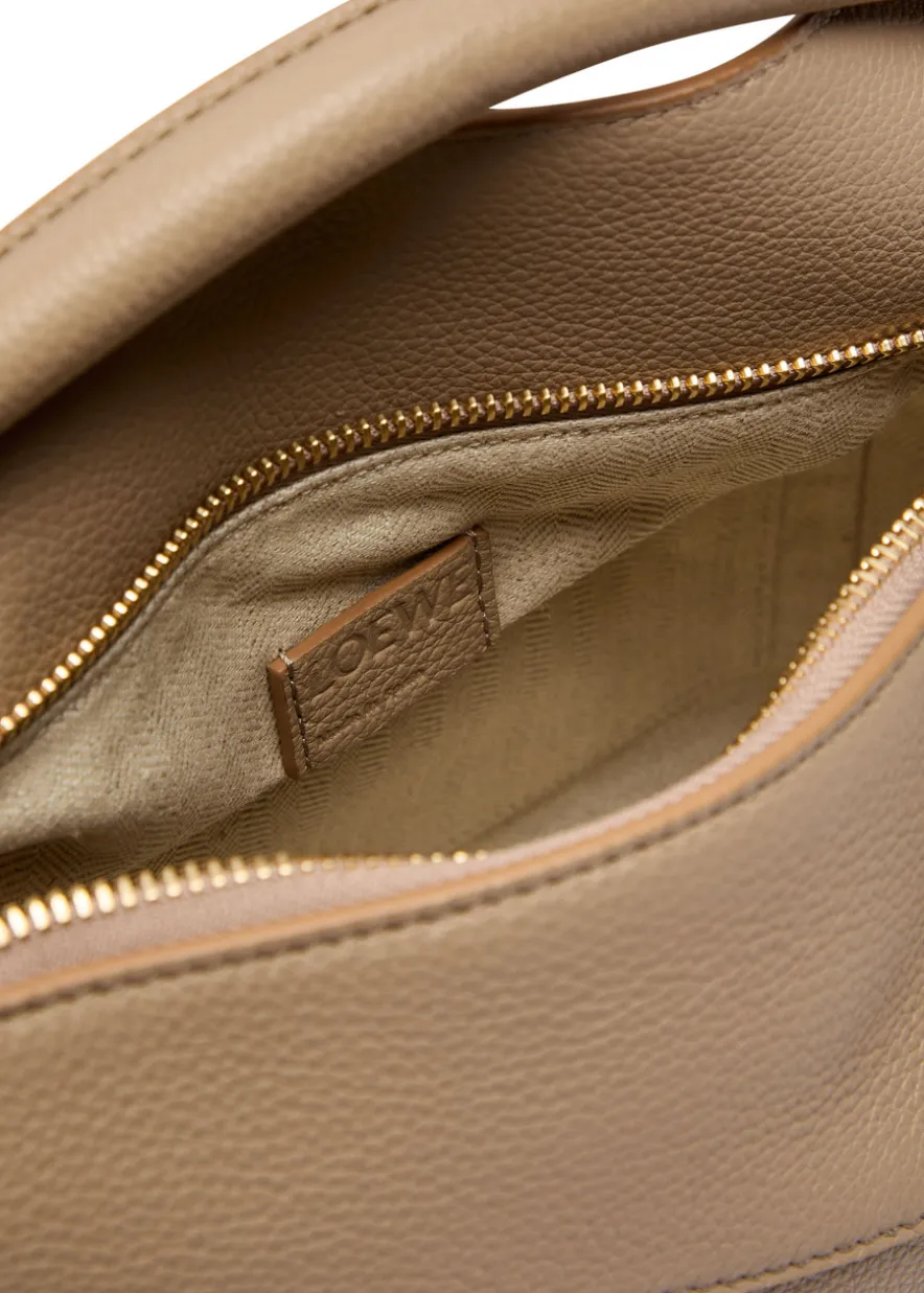 Puzzle Edge small leather top handle bag