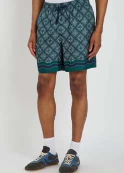 Radiating logo-monogram silk shorts