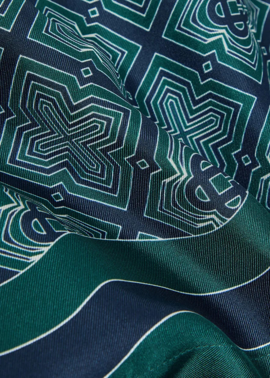 Radiating logo-monogram silk shorts