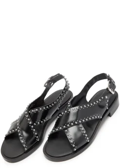 Remi stud-embellished glossed leather sandals