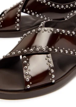 Remi stud-embellished patent leather sandals