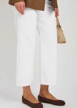 Reva Travel logo suede ballet flats