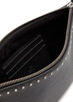 Rockstud-embellished grained leather pouch