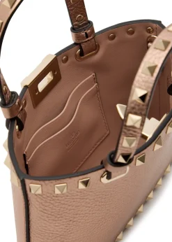Rockstud mini metallic grained leather top handle bag