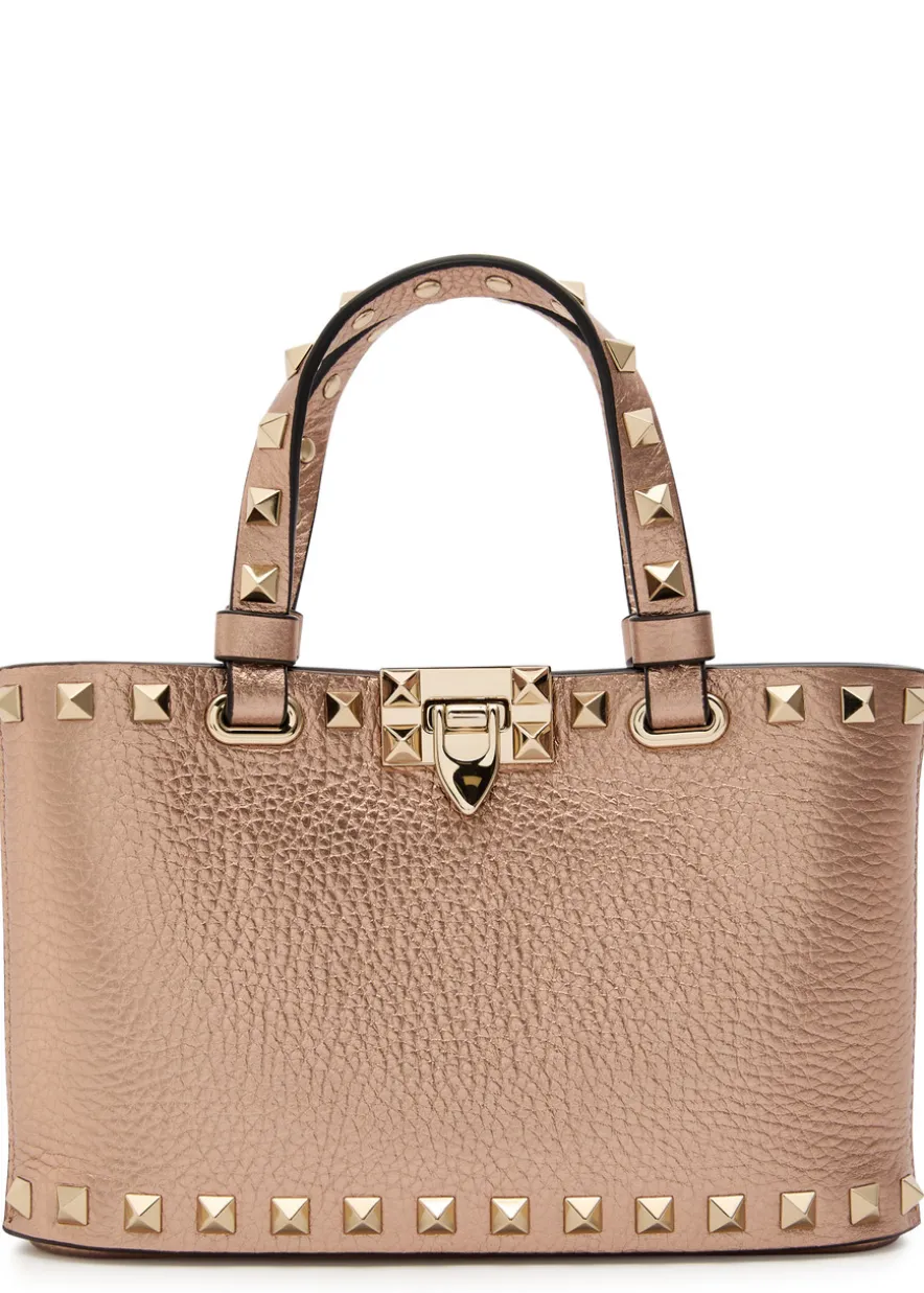 Rockstud mini metallic grained leather top handle bag