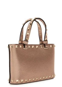 Rockstud mini metallic grained leather top handle bag