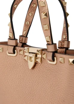 Rockstud mini metallic grained leather top handle bag