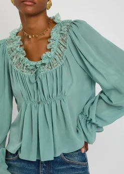 Ruffled lace-trim silk blouse