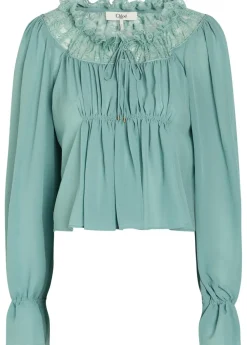 Ruffled lace-trim silk blouse
