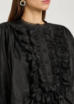 Ruffled shell blouse
