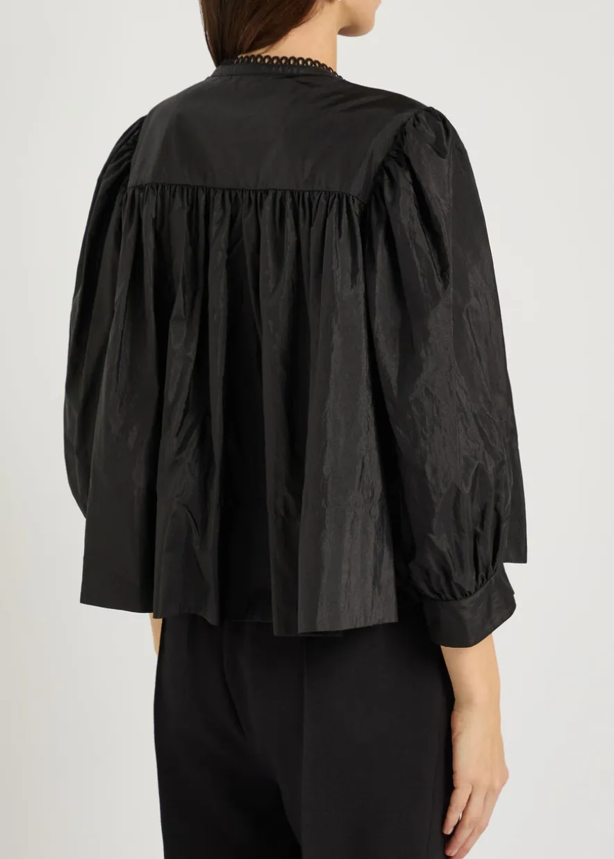 Ruffled shell blouse