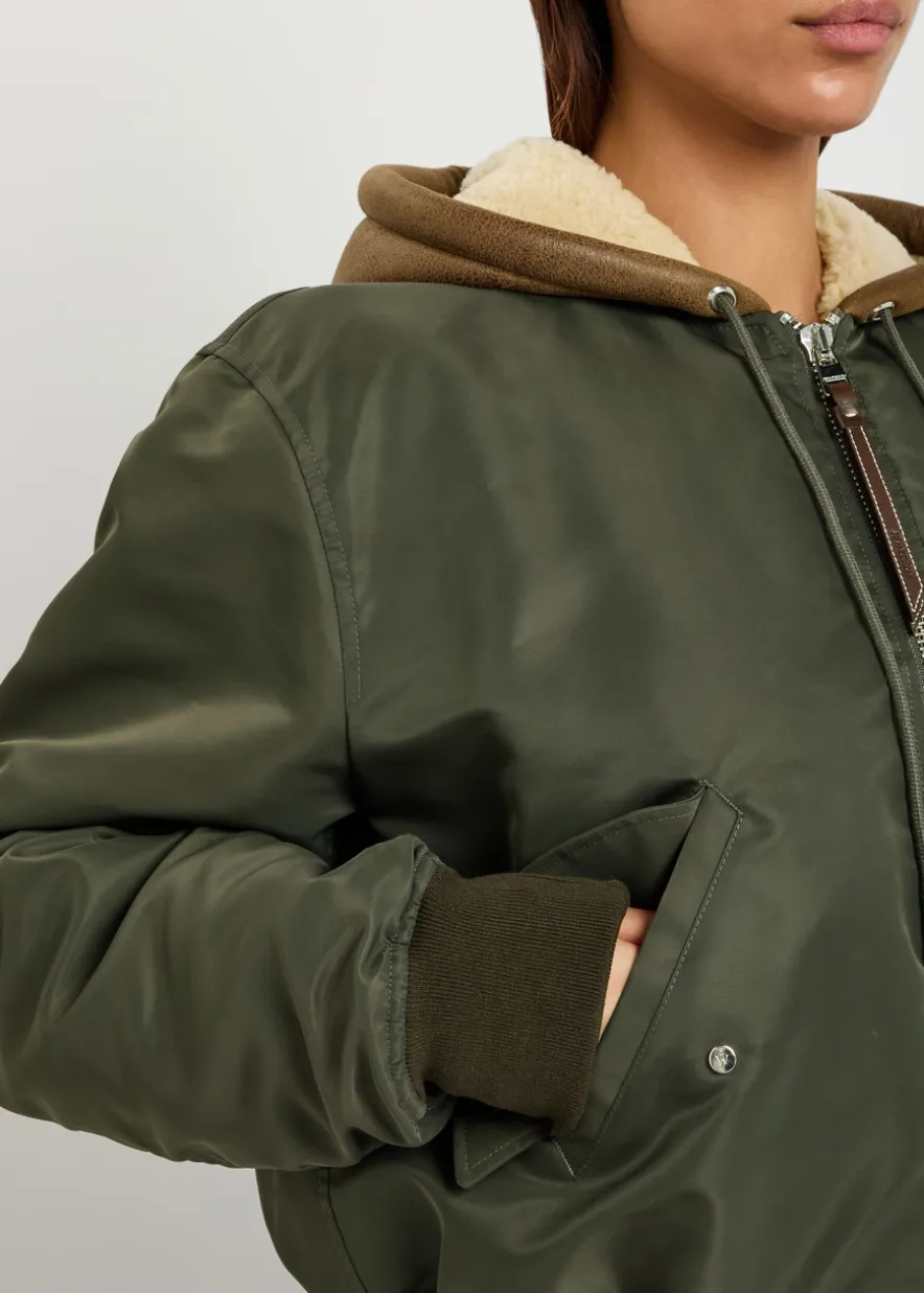Shearling and leather-trim hooded shell bomber jacket