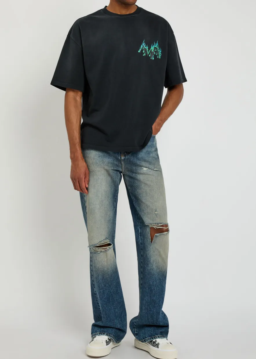 Slashed distressed bootcut jeans