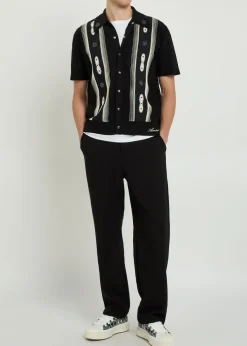 Striped embellished wool-blend shirt