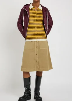 Striped ribbed cotton-knit polo top