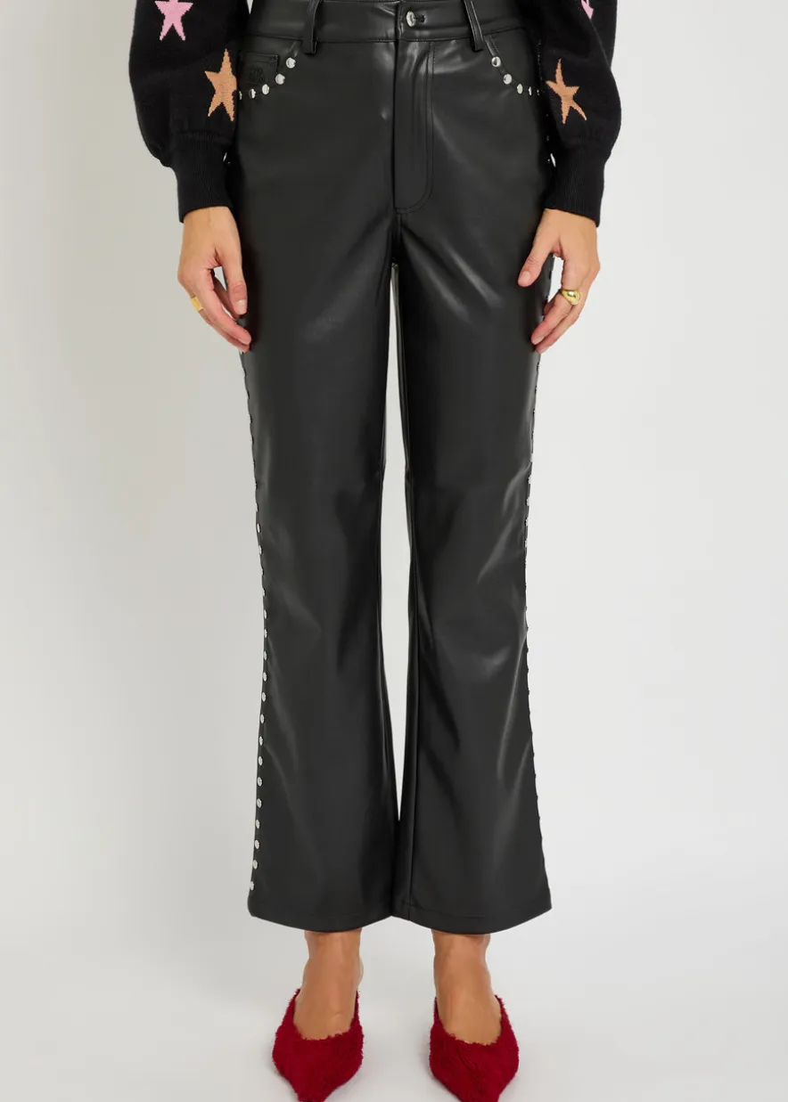 Stud-embellished faux leather trousers