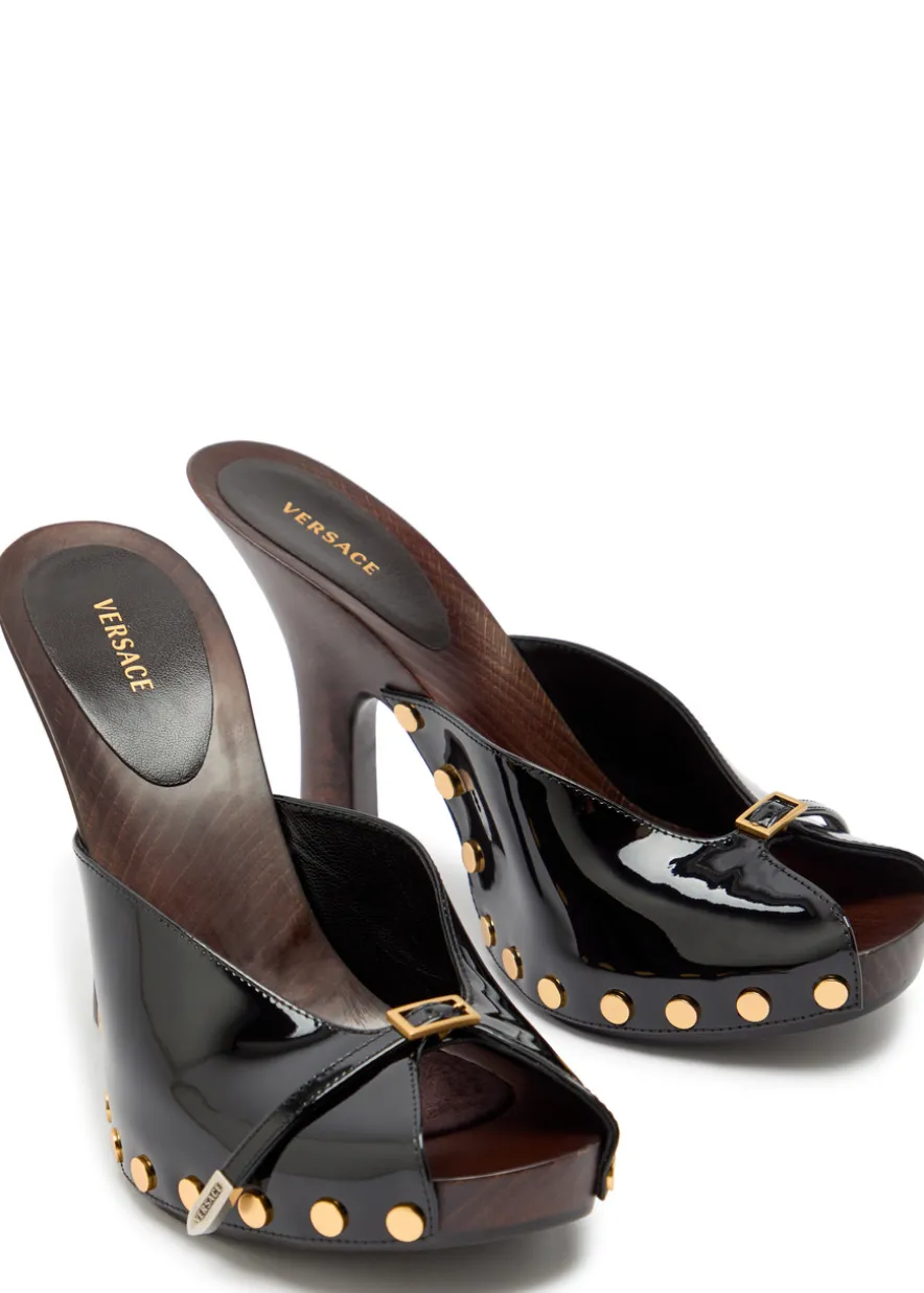 105 stud-embellished wooden and patent leather mules