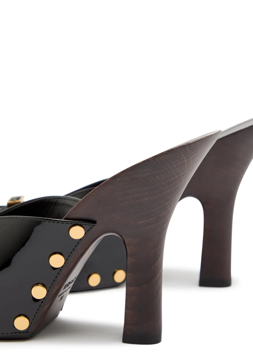 105 stud-embellished wooden and patent leather mules