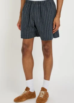 Sunday logo checked stretch-linen shorts