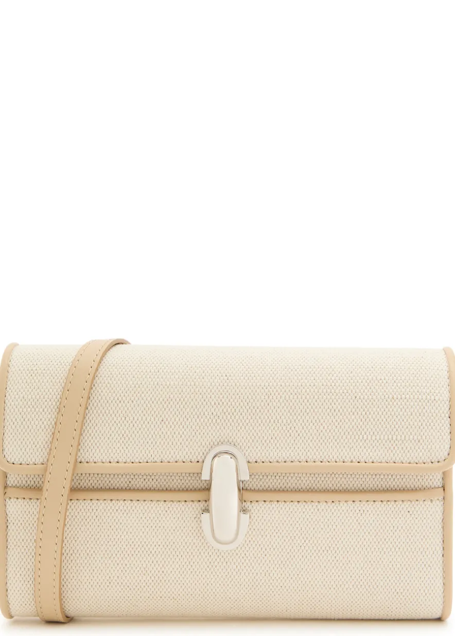 Symmetry canvas and leather mini bag