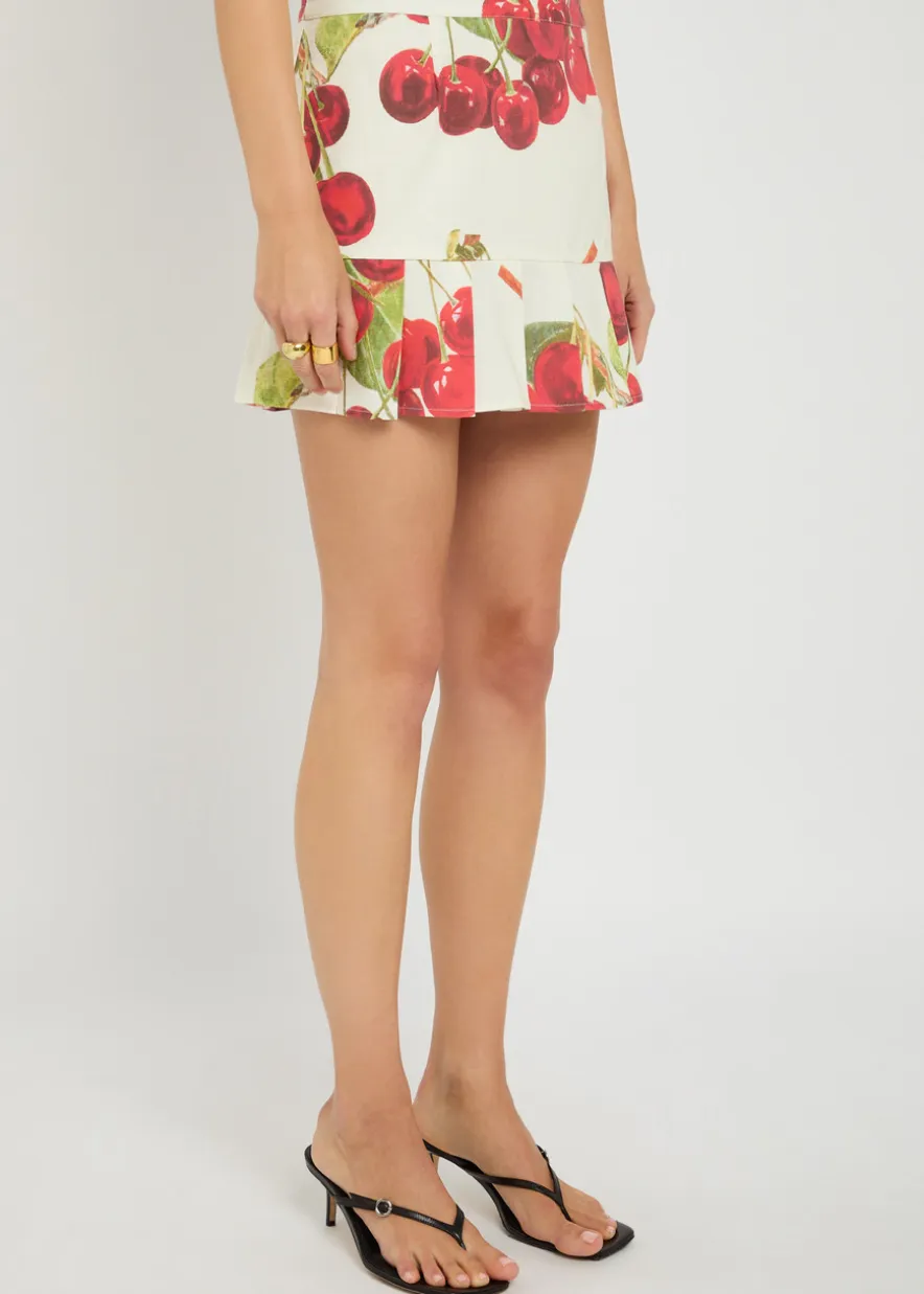 The Cherry Pleat cotton-blend mini skirt