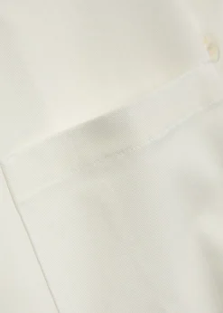 The Emma stretch-twill sleeveless shirt