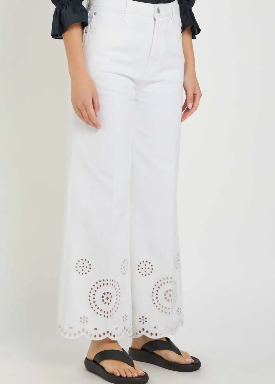 The Eyelet Flare embroidered flared-leg jeans