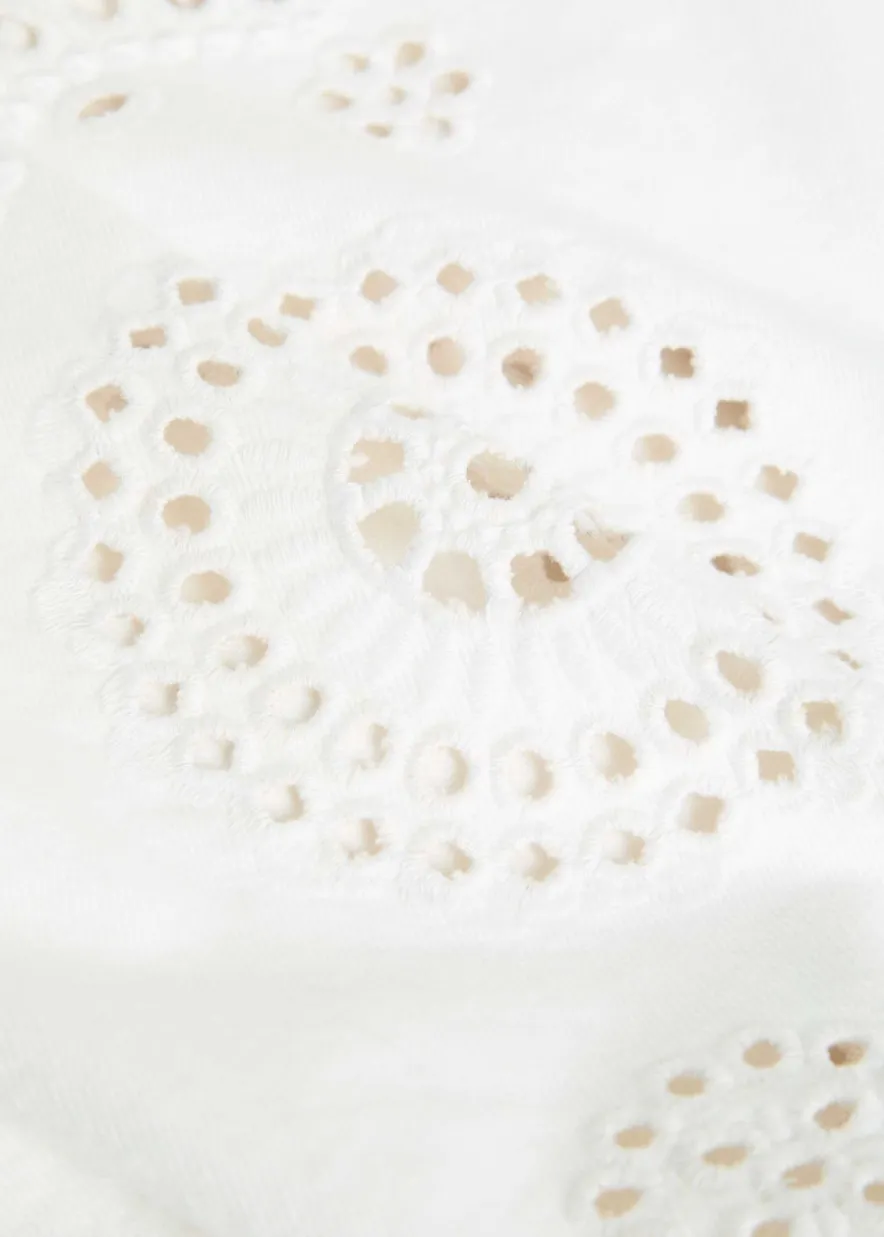 The Eyelet Flare embroidered flared-leg jeans
