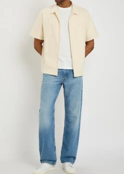 The Relaxed straight-leg jeans