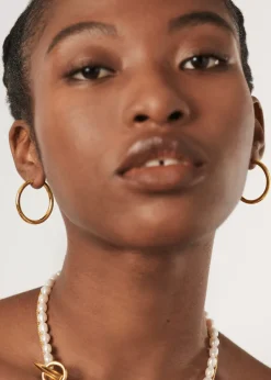 Tunnel large 18kt gold-plated hoop earrings