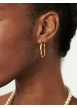 Tunnel large 18kt gold-plated hoop earrings