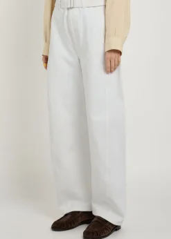Twisted belted barrel-leg jeans