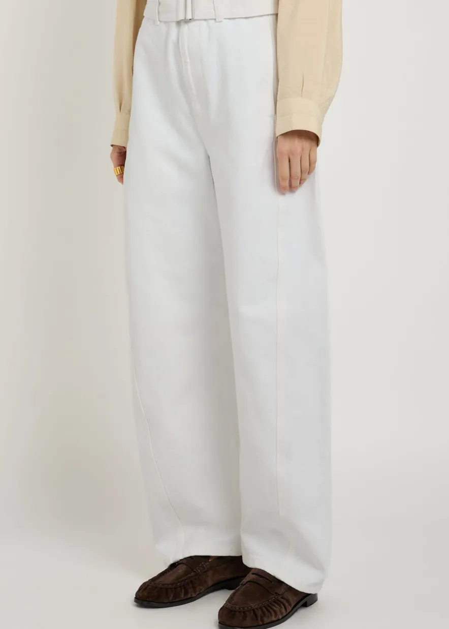 Twisted belted barrel-leg jeans