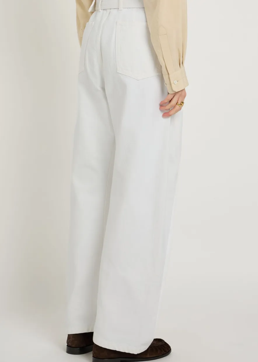 Twisted belted barrel-leg jeans