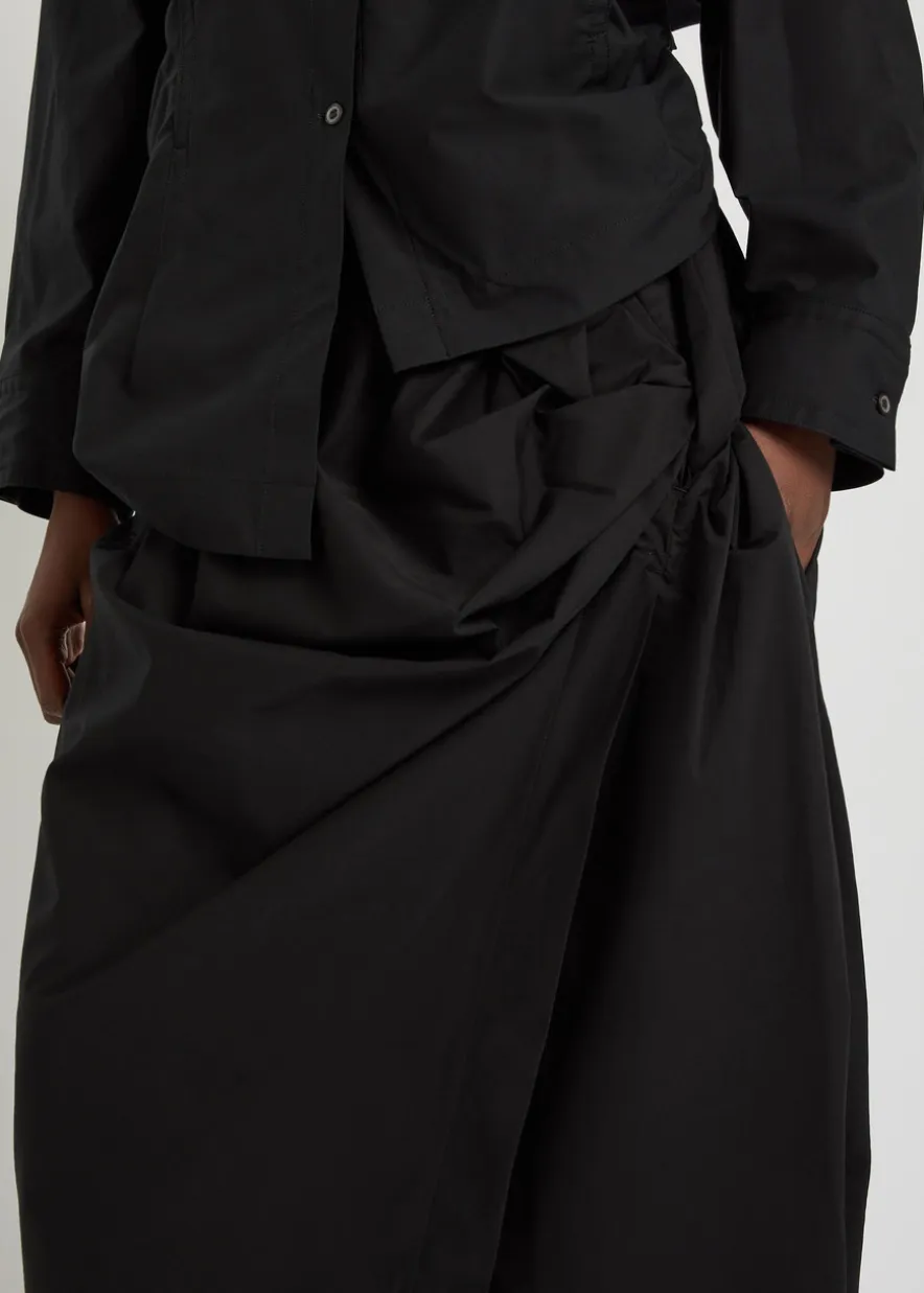 Twisted draped cotton-blend trousers